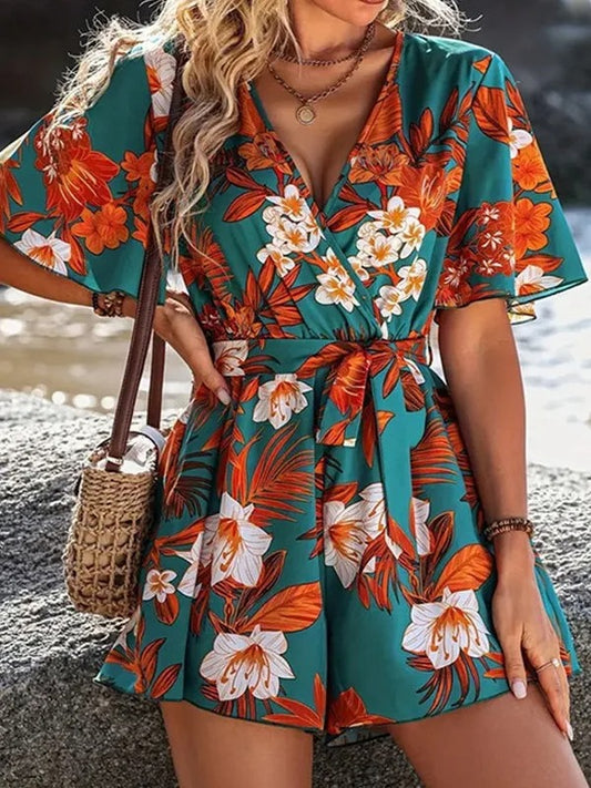 Penelope - Romper mit Blumenmuster und Wickelausschnitt