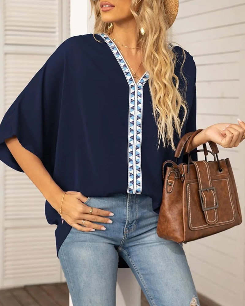 Lyla - Lockere Bluse mit V-Ausschnitt und Fledermausärmeln