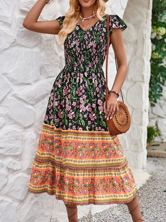 Cassandra - Elegantes Blumen-Kleid mit kurzen Ärmeln