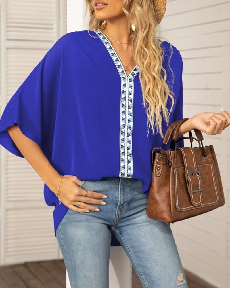 Lyla - Lockere Bluse mit V-Ausschnitt und Fledermausärmeln