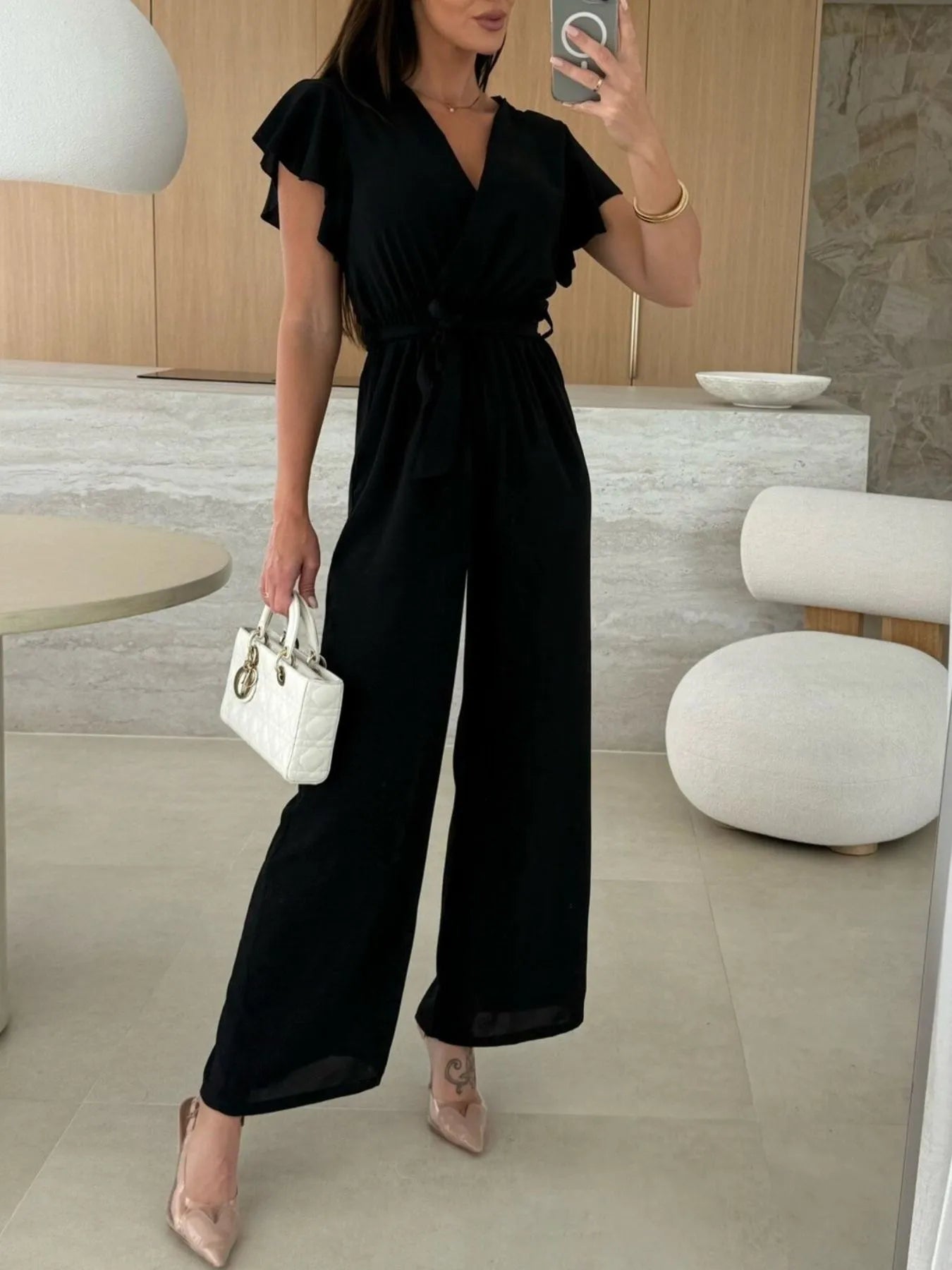 Roxanne - Eleganter Jumpsuit mit weitem Bein, Rüschen und Bindegürtel