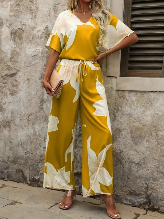 Estelle - Elegantes Set mit V-Ausschnitt-Bluse und weitem Blumenhose für Damen