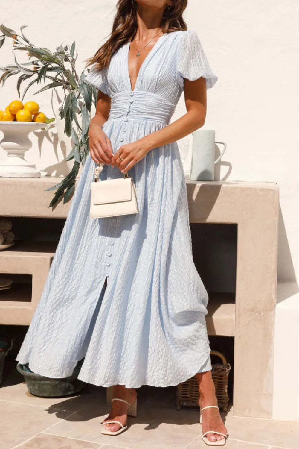 Clarissa - Elegantes Kleid mit Puffärmeln und tiefem V-Ausschnitt