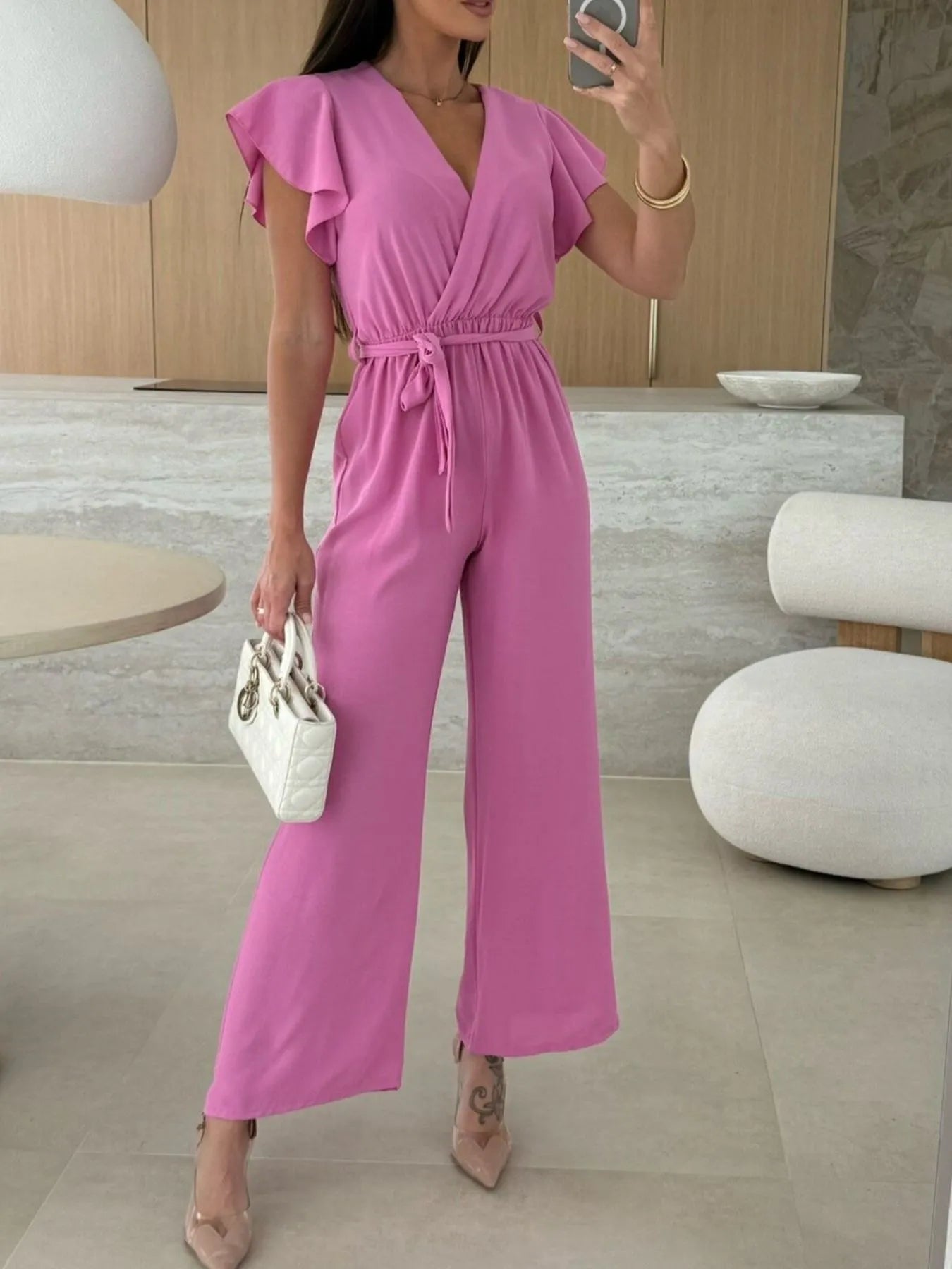 Roxanne - Eleganter Jumpsuit mit weitem Bein, Rüschen und Bindegürtel