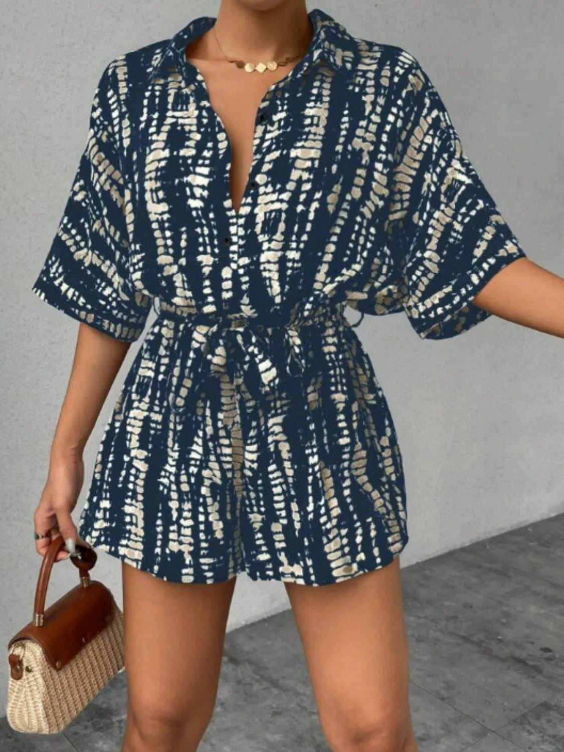Patricia - Eleganter Jumpsuit mit halblangen Ärmeln und Taillengürtel