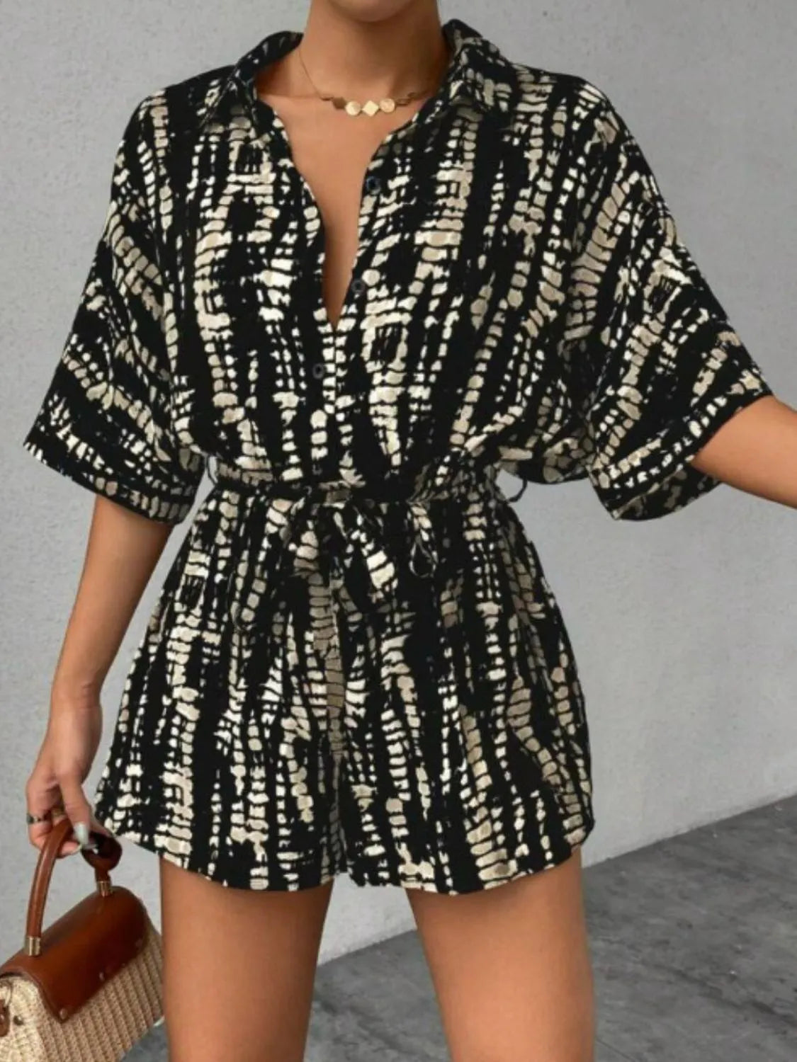 Patricia - Eleganter Jumpsuit mit halblangen Ärmeln und Taillengürtel