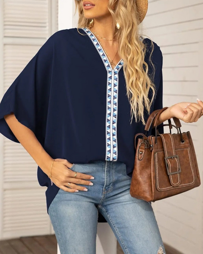 Lyla - Lockere Bluse mit V-Ausschnitt und Fledermausärmeln
