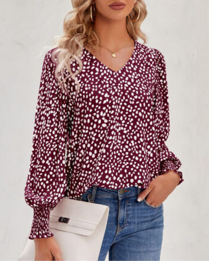 Maureen - Elegante gemusterte Bluse mit V-Ausschnitt und Puffärmeln