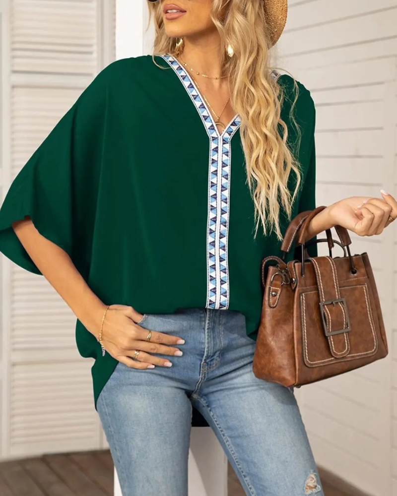 Lyla - Lockere Bluse mit V-Ausschnitt und Fledermausärmeln