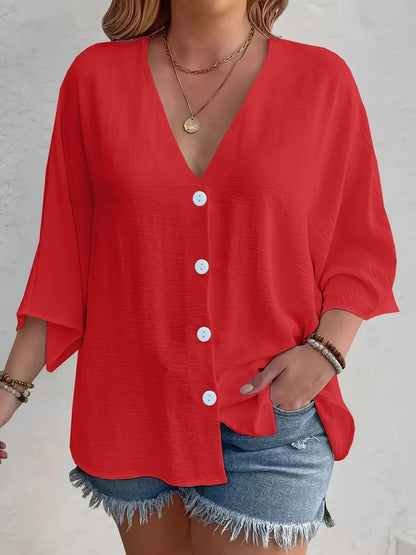 Amirah - Lässige Bluse mit halblangen Ärmeln, V-Ausschnitt und Knöpfen