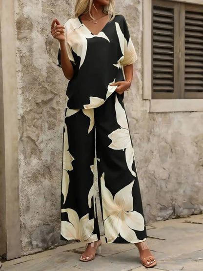 Estelle - Elegantes Set mit V-Ausschnitt-Bluse und weitem Blumenhose für Damen