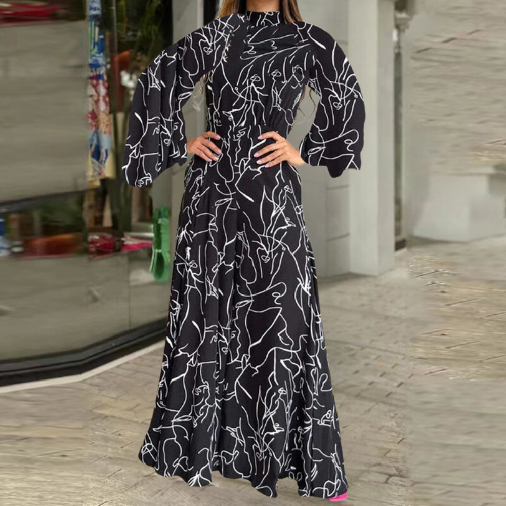 Celia - Eleganter Jumpsuit mit abstraktem Muster und langen Ärmeln