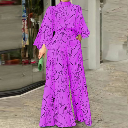 Celia - Eleganter Jumpsuit mit abstraktem Muster und langen Ärmeln