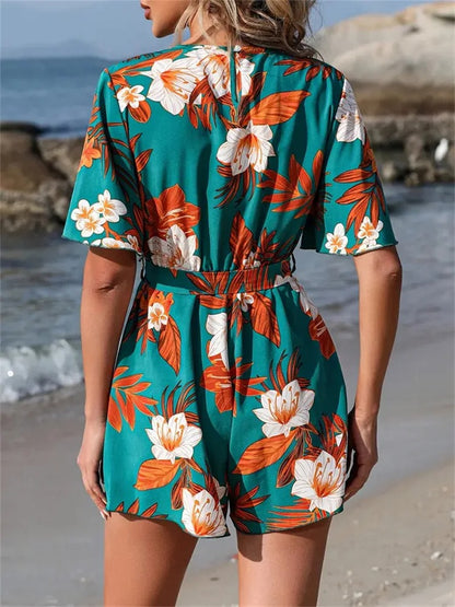 Penelope - Romper mit Blumenmuster und Wickelausschnitt